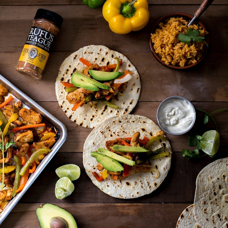 simple spiced chicken fajitas on sheet pan with peppers and onions and Rufus Teague Chick N Rub