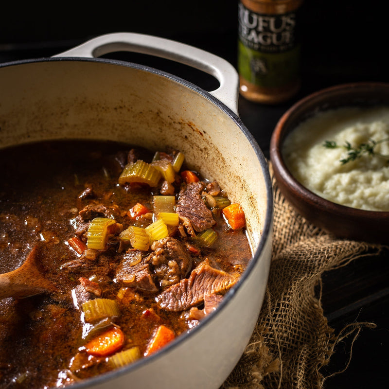 Guinness beef stew in dutch oven with vegetables and Rufus Teague Meat Rub