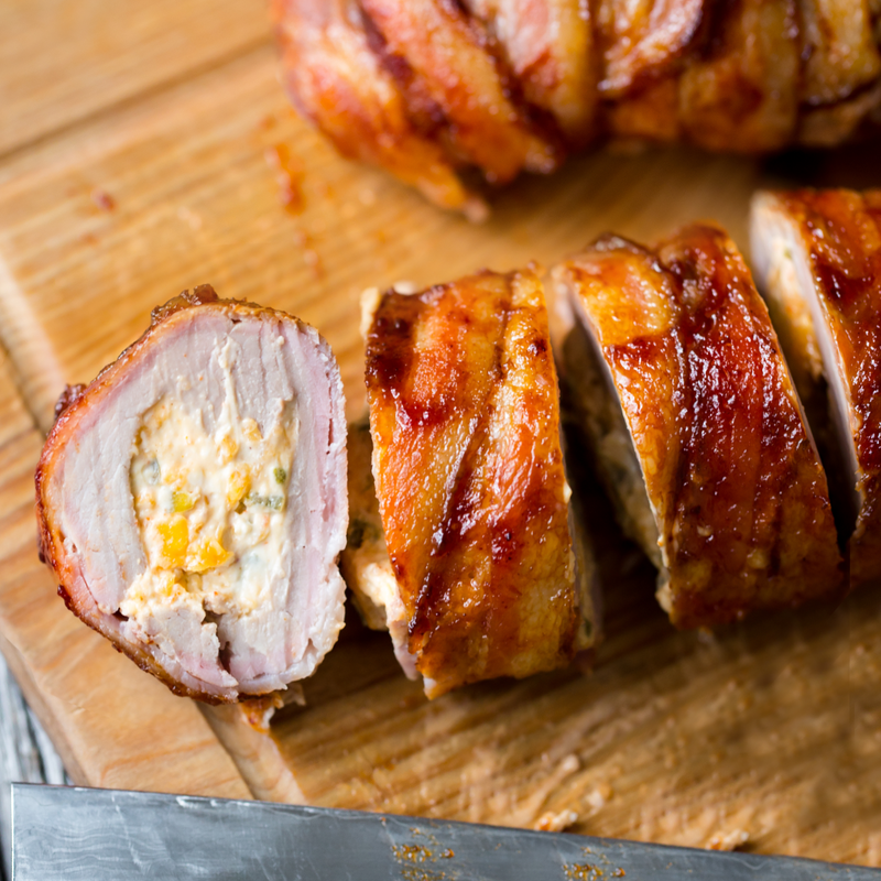 jalapeno popper pork recipe on cutting board with knife